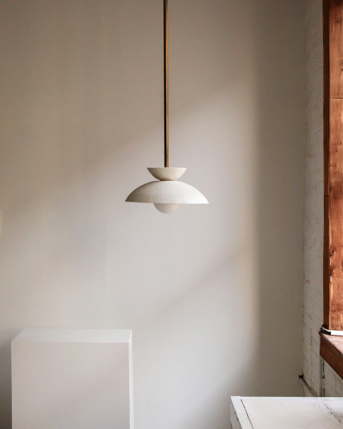 Augustus Pendant // Stone / Patina Brass // Photo by William Jess Laird